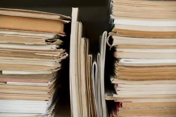 shelf stacked with notepads